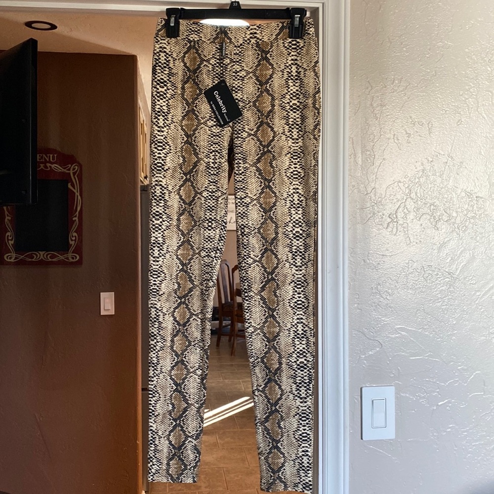 Medium 12th Tribe Snakeskin leggings. Never worn! Still attached tag.